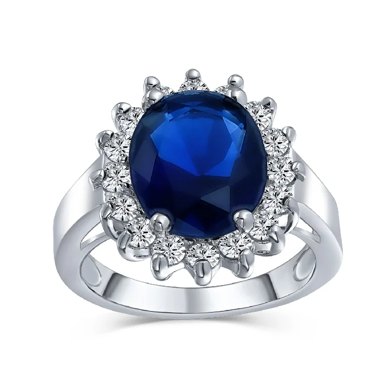 Engagement rings with east-west moonstone settings -Classic 5CTW Royal Blue CZ Crown Halo Oval Simulated Sapphire Engagement Ring