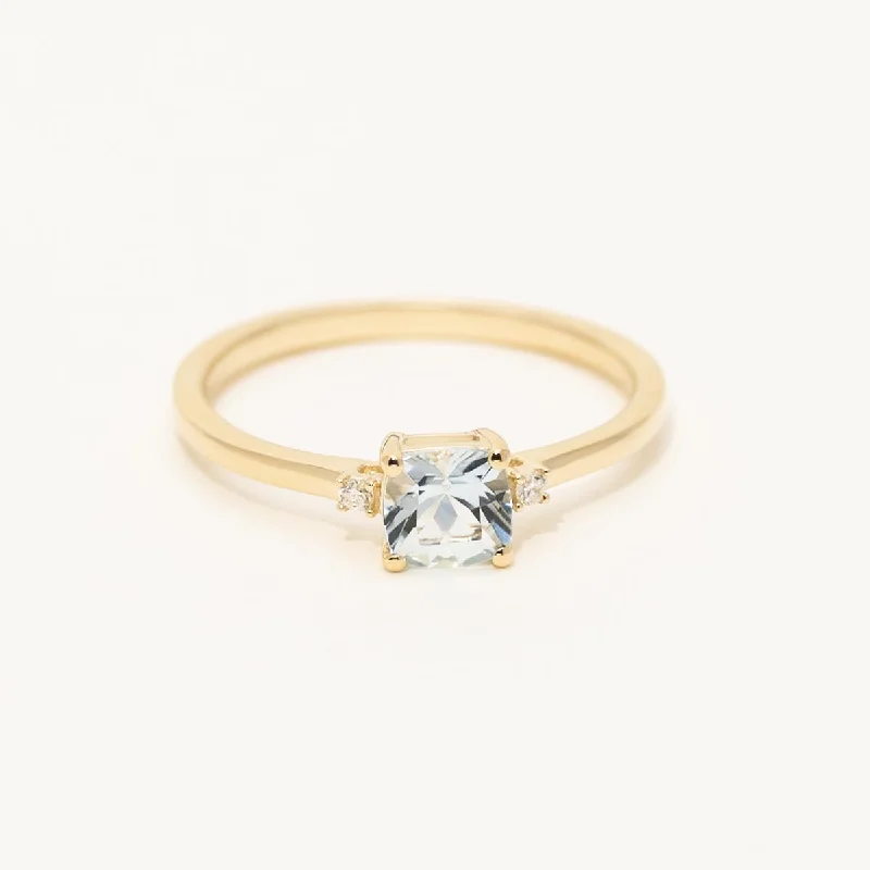 Women’s rings with starburst garnet for beauty -Cushion Cut Aquamarine Ring in 10kt Yellow Gold with Diamonds (.02ct tw)