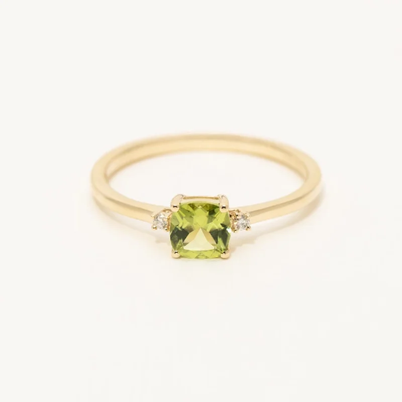 Women’s silver rings featuring bold turquoise gems -Cushion Cut Peridot Ring in 10kt Yellow Gold with Diamonds (.02ct tw)