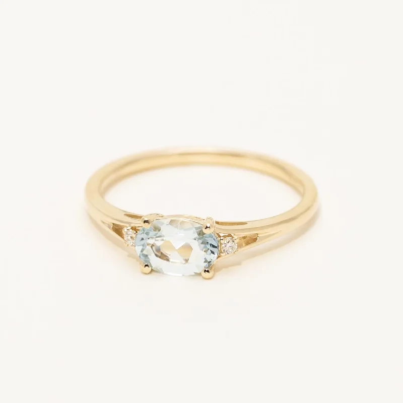 Women’s layered rings with mixed gemstone bands -Oval Aquamarine Ring in 10kt Yellow Gold with Diamonds (.02ct tw)