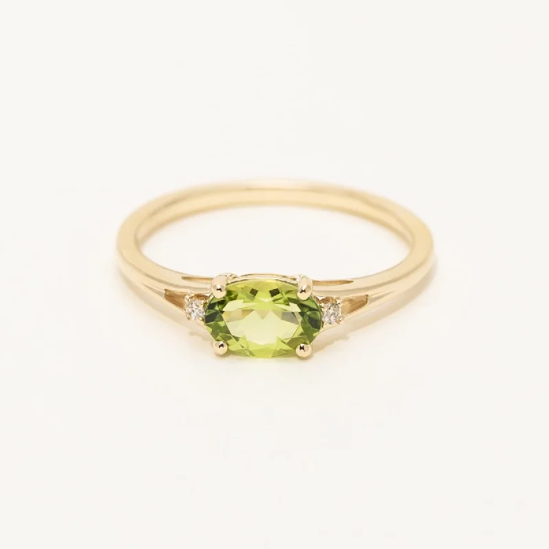 Women’s titanium rings with sleek modern designs -Oval Peridot Ring in 10kt Yellow Gold with Diamonds (.02ct tw)